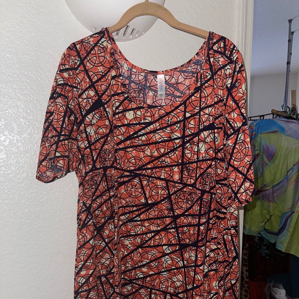 3 tops by LuLaRoe size 2xl (sold as a bundle only).  See all pictures for each.